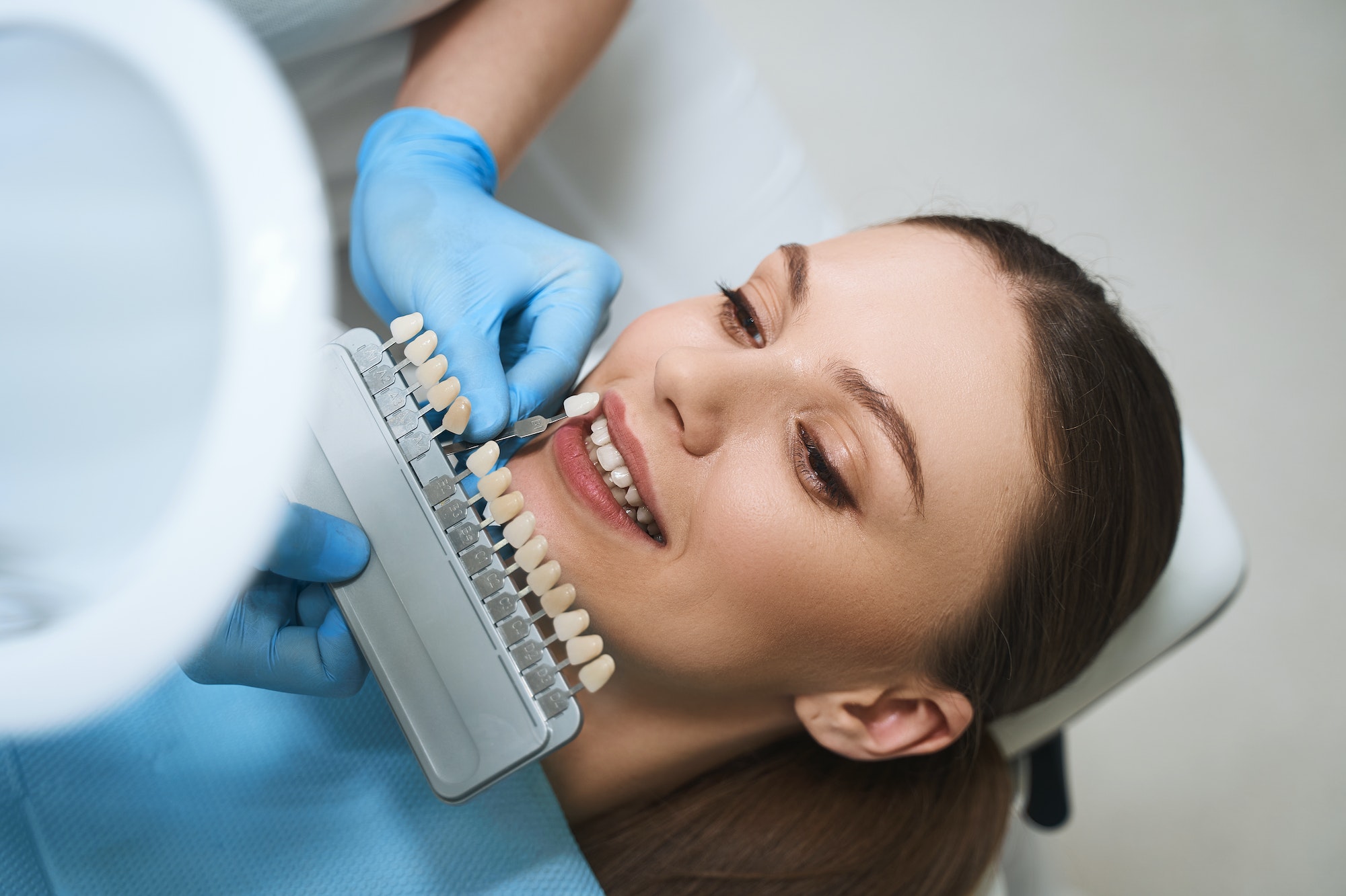 Merry woman coming to dentist stock photo